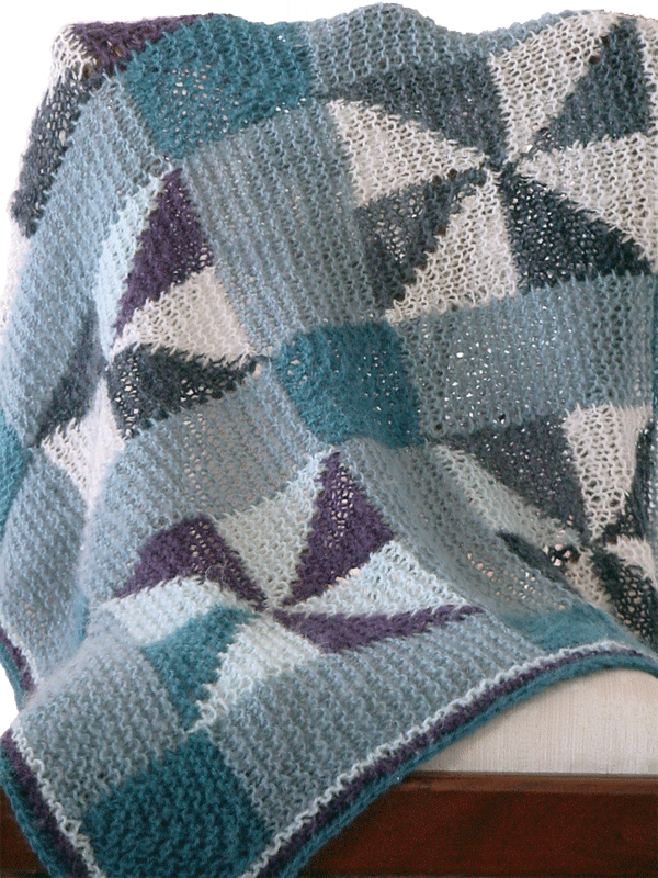 Fiber Dreams Pinwheel Blanket. Uses #4/Worsted weight yarn or thicker.